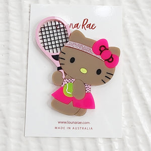 HK Tan & Playing Tennis Brooch