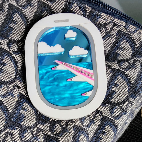 Window Seat with Plane View Brooch