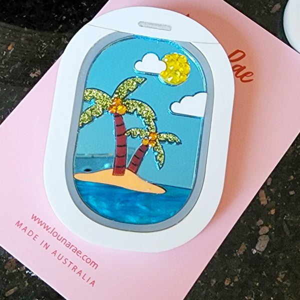 Window Seat With Tropical Island View Brooch